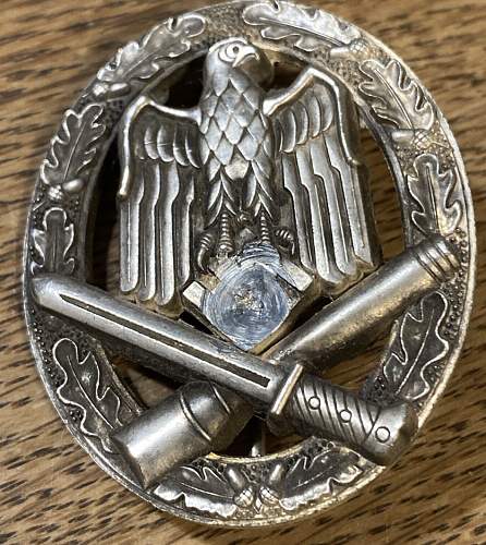 Hello! Could someone authenticate this Allgemeines Sturmabzeichen with a traumatized looking eagle?