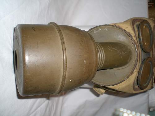 Question:  I have a WWII gas mask and am wondering if anyone can tell me the orgin or the value.