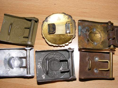 6 belt buckles.