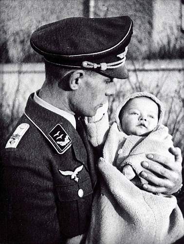 Soldier with boy &amp; boy in uniform