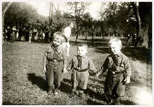 Soldier with boy &amp; boy in uniform