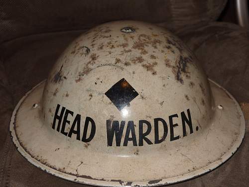 Unusual wardens helmet with stars - rank?