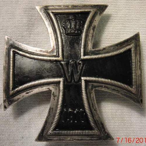 4 German Medals/pins: Eisernes Kreuz, Kriegsverdienstkreuz, NSDAP Dienstauszeichnung in Bronze, and hat pin.