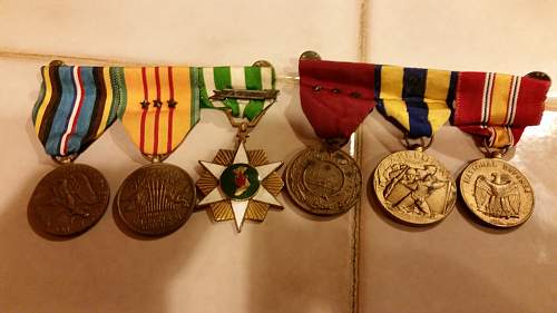 Can someone please give me more info on these medals and pins?