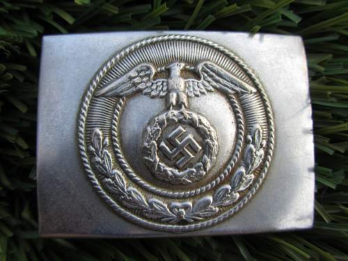 Help Identifying Belt Buckle found in Garbage!