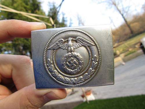 Help Identifying Belt Buckle found in Garbage!