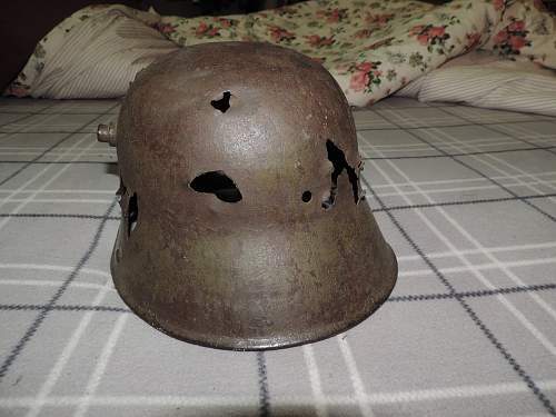 WW1 Battle Damaged German Helmet