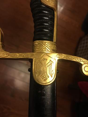 German Officer sword fake or real? (Dove Head)