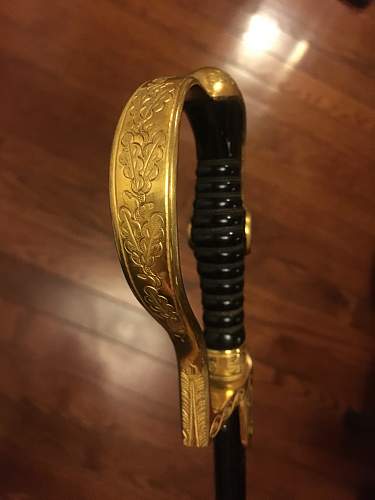 German Officer sword fake or real? (Dove Head)