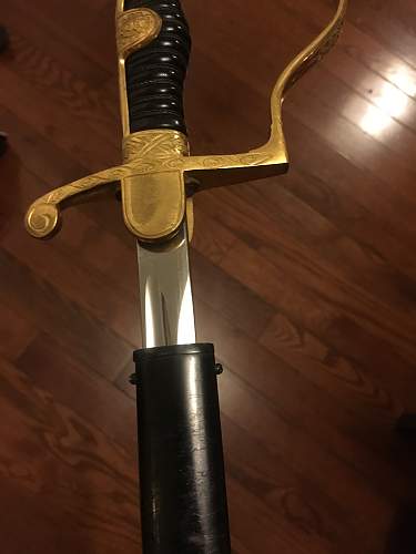 German Officer sword fake or real? (Dove Head)