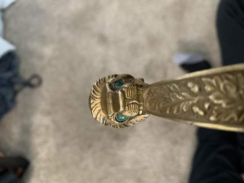 WKC Lion Head Sword Authentication