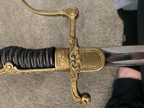 WKC Lion Head Sword Authentication