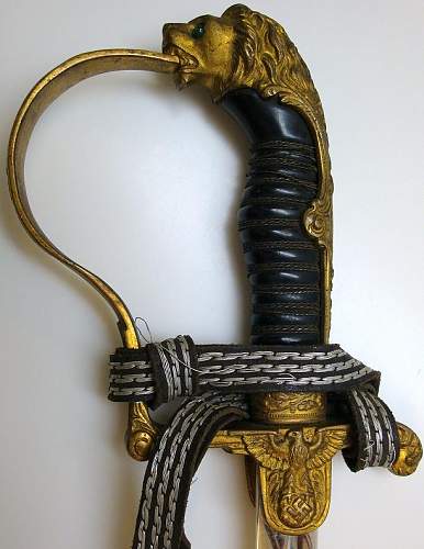 WKC Lion Head Sword Authentication